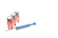 Syringe and vitamin shot Royalty Free Stock Photo