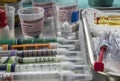 Syringes of insulin medication next to medicine vials prepared in hospital