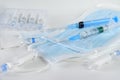 Syringes with medicine, ampoules, tablets, blue medical masks on a white background, coronavirus Royalty Free Stock Photo