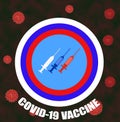 Russian virologists have created a vaccine against coronavirus. Syringes of white, red and blue against a blue sky in a circle