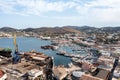 Syros island, Greece, aerial drone view. Saiboats moored at Ermoupolis port dock, yachts marina Royalty Free Stock Photo