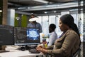 System administrator in office using AI automation scripts Royalty Free Stock Photo