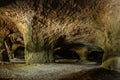 System of caves in sandstone rocks called Puste kostely near Novy Bor, Czech republic.Large underground quarry.Popular tourist Royalty Free Stock Photo