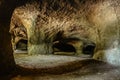 System of caves in sandstone rocks called Puste kostely near Novy Bor, Czech republic.Large underground quarry.Popular tourist Royalty Free Stock Photo