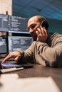 System engineer answering phone call late