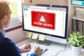 System hacked alert on computer screen after cyber attack on network. Cybersecurity vulnerability on internet, virus, data breach Royalty Free Stock Photo