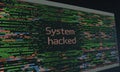 System hacked message on computer screen with glitching code and data breach warning Royalty Free Stock Photo