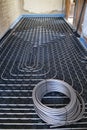 System radiant floor with polyethylene pipes. Royalty Free Stock Photo