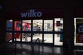 Wilko main entrance, Syston, Leicester, UK, taken at night time with lights on in store, empty store