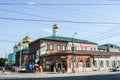 Syzran`, Russia - August, 16,2016: View of the Central street of the city with stone houses and turquoise Cathedral.