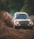 SZCZECIN, POLAND - Aug 31, 2019: Off-road buddy taking a sharp turn, kicking up sand as it speed passes with ease on Baja Poland