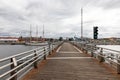 Szczecin, Zachodniopomorskie / Poland - August, 27, 2020: Wooden footbridge for passenger and transport traffic. A new crossing to