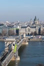 Szechenyi chain bridge over Danube river under renovation and Saint Stephen`s Basilica in Budapest, Hungary Royalty Free Stock Photo