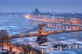 Szechenyi chain bridge and Budapest view in winter night Royalty Free Stock Photo