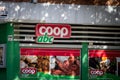 Coop Mini logo on their main supermaket in Szeged.