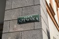 Szewska street name sign in the Old Town district of Krakow, Poland.