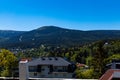 Cityscape of city buildings with panorama of Giant Mountains