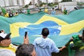 Patriots wave the Brazilian flag on the Dutra highway