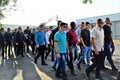 Young army soldiers in plain clothes arriving for event with the President