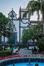 SÃÂ£o Miguel, Azores PORTUGAL - 10 August 2020 - Antero de Quental Garden with two elderly women sitting on benches in Vila Franca