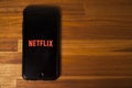 Leading platform in the movie streaming segment, netflix with the application open on a cell phone.