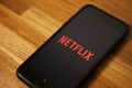 Leading platform in the movie streaming segment, netflix with the application open on a cell phone.