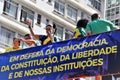 Liliane Ventura talks to the people on the platform on Paulista avenue