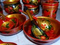 Wooden spoons and kitchen tableware. Closeup. Khokhloma - an ancient Russian folk craft XVII century. Royalty Free Stock Photo