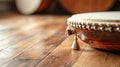 Close-up of a traditional drum resting on a wooden floor Royalty Free Stock Photo