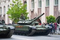 T-72B3 tanks. Military equipment drives through the streets of the city.