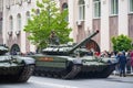 T-72B3 tanks. Military equipment drives through the streets of the city.