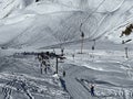 T-bar ski lift (Schlepplift mit T-BÃ¼gel-Anker) on the snowy slopes of the Swiss alpine winter resort of Arosa Royalty Free Stock Photo