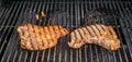 T-Bone steaks on grill