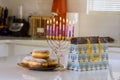 It is common to light candles in the hanukkiah menorah in celebration of Hanukkah in Judaism traditions, family