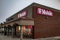 T Mobile retail store exterior illuminated in the evening