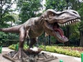 T rex dinosaur statue in the middle of Bandung city park