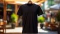 T-shirt closeup. Black tshirt mockup. Blank template Tee mock-up on street background. Casual urban male clothes. Summer short-