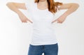 T-shirt design and advertising concept. Style and fashion. Indoor shot of cheerful smiling youngred head woman with red hair Royalty Free Stock Photo