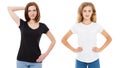 T-shirt design and people concept - close up of young two woman in shirt blank black and white tshirt isolated. Girl t shirt set Royalty Free Stock Photo