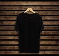 T-shirt mockup and template on wood background for fashion and graphic designer Royalty Free Stock Photo