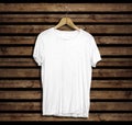 T-shirt mockup and template on wood background for fashion and graphic designer Royalty Free Stock Photo