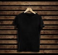 T-shirt mockup and template on wood background for fashion and graphic designer Royalty Free Stock Photo