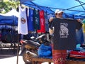 T-shirt`s seller at open air market, Luang Prabang, Laos Royalty Free Stock Photo