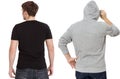 T shirt and sweatshirt template. Men in black tshirt and in grey hoody. Back rear view. Mock up isolated on white background. Copy Royalty Free Stock Photo