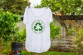 T shirt on washing line with circular economy textiles icon, make, use, reuse, swap, donate, recycle Royalty Free Stock Photo