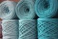 T-shirt yarn balls light blue color on shop shielf. Handmade craft recycle eco concept