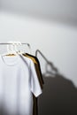 T-shirts displayed on clothes rack