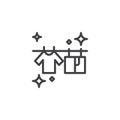 T-shirts hanging on a clothesline outline icon