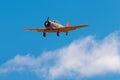 T-6 Texan airplane above clouds