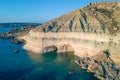 Ta Marija caves with kayakers next to the cave entrance, Malta